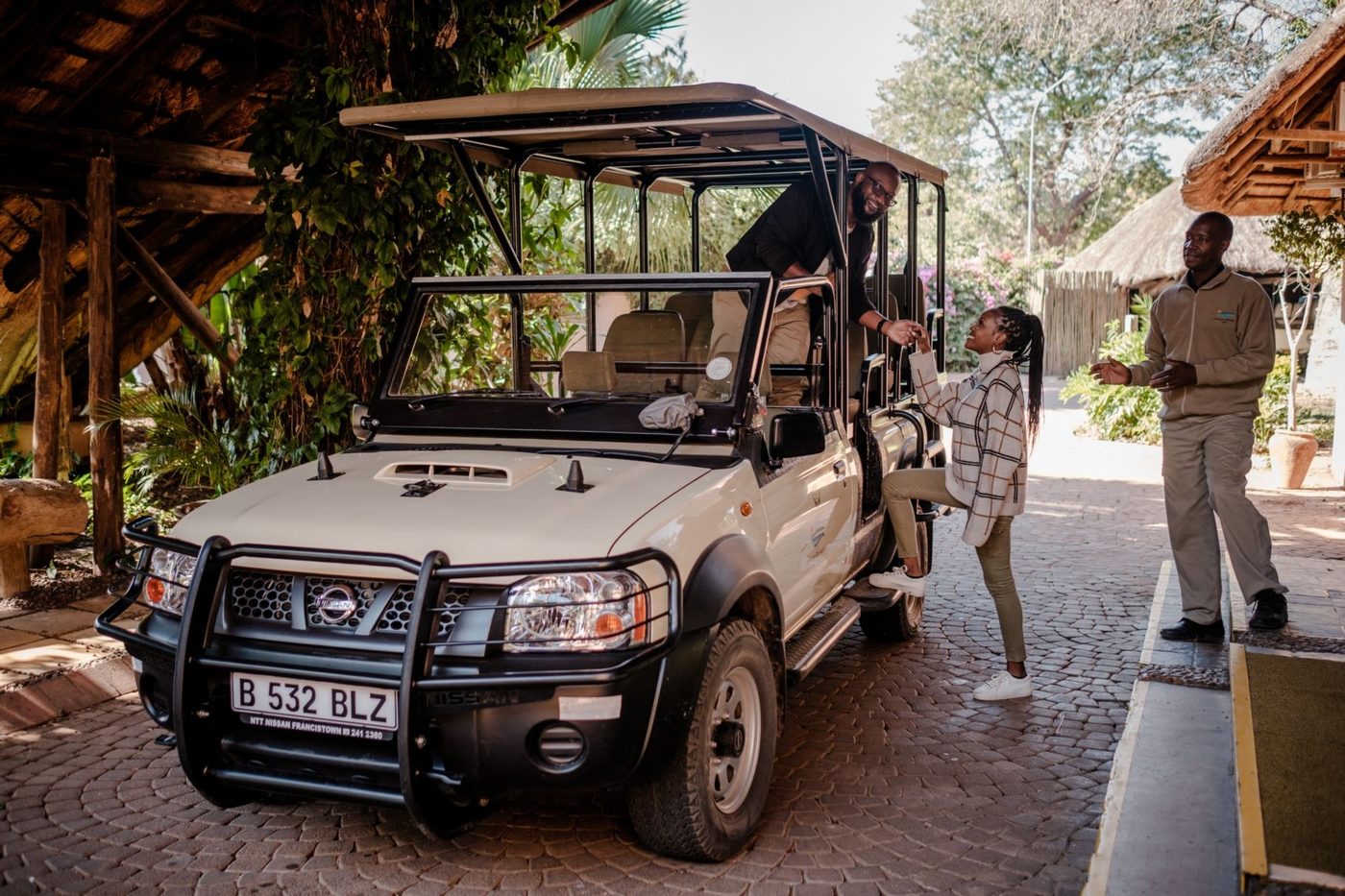 Safari vehicle arriving with guests at Chobe Marina Lodge