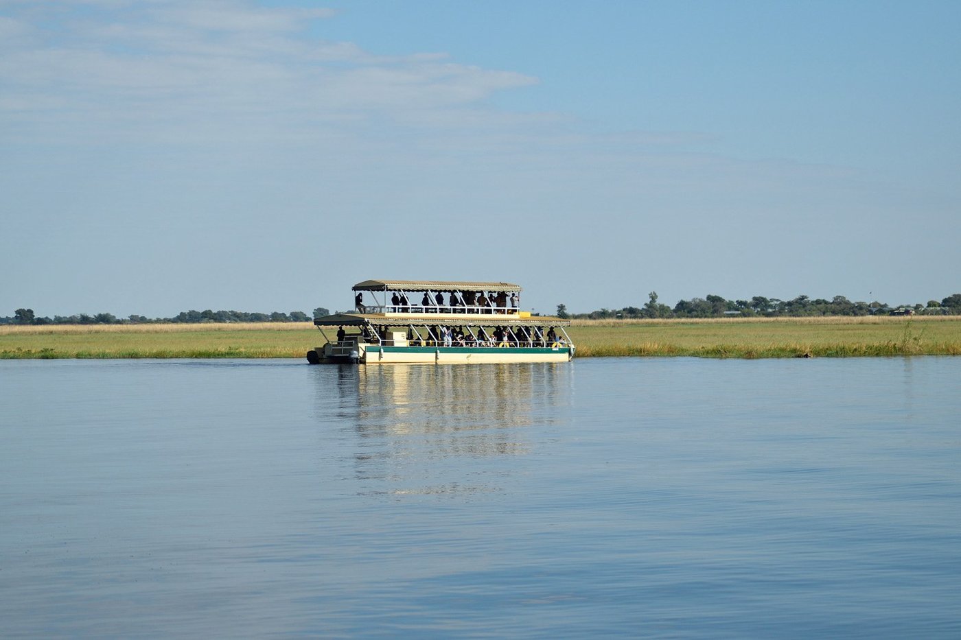 Guests on a river cruise boat near Chobe River Lodge