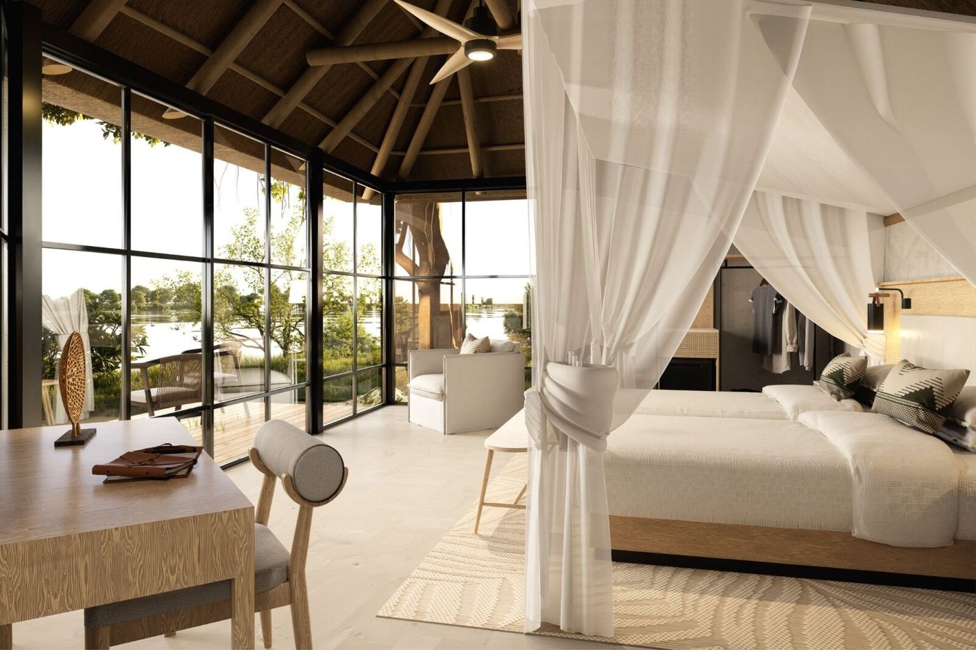 Bedroom with canopy drapes and floor-to-ceiling windows at Chobe Savanna Lodge
