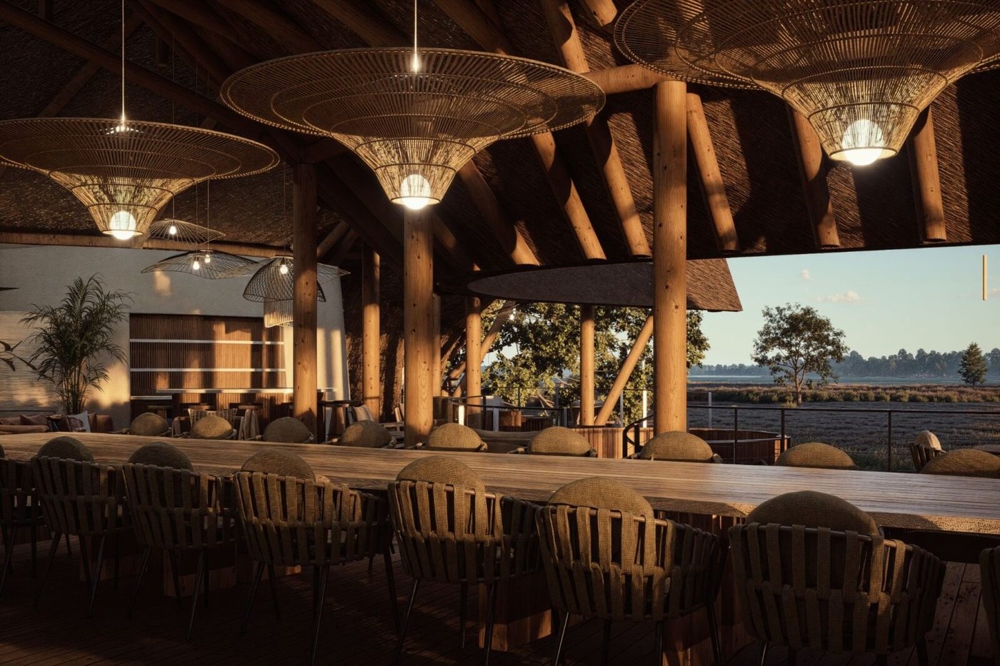 Open-air lounge and dining area with pendant lights at Chobe Savanna Lodge
