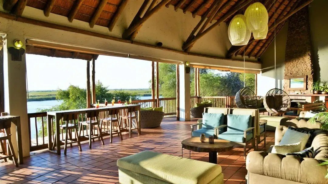 Open-air restaurant deck overlooking the river at Cresta Mowana Safari Resort & Spa, Chobe