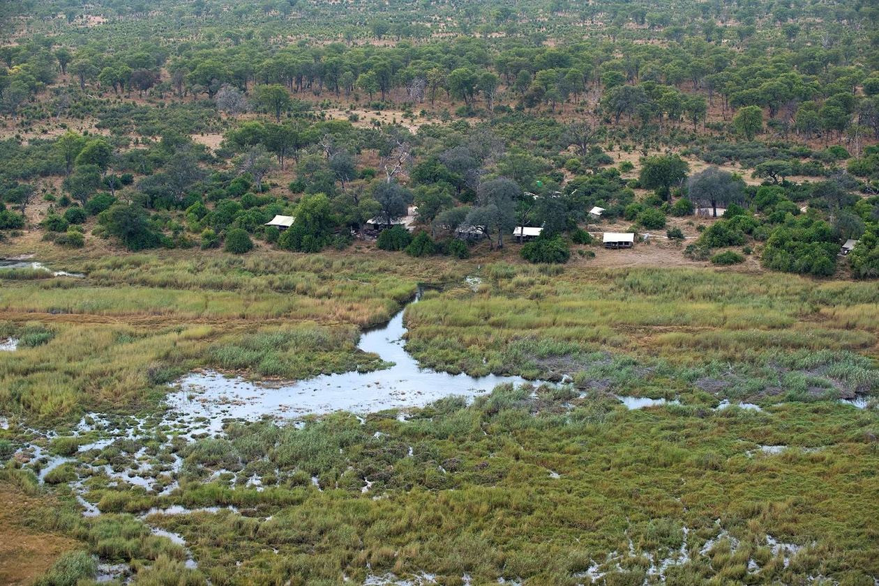 Aerial view of the camp set among wetland channels at Linyanti Ebony