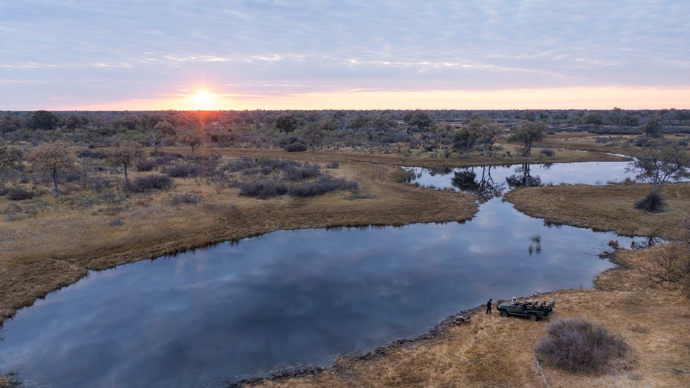 View of the floodplain channel at dusk near Selinda Explorers Camp